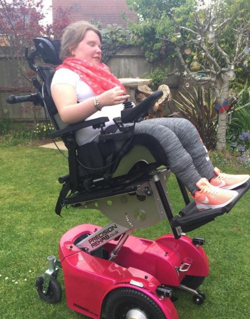 This is a photo of Andie, power wheelchair user 