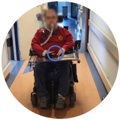 This is a photo of Thomas in his electric wheelchair